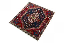 Corner detail of 2000s Shiraz rug showing border pattern and Wool pile