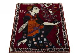 Surface texture of 2000s Shiraz rug with natural Wool and intricate pattern