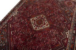 Backside of handmade 2000s Shiraz rug showing knot structure and weave density