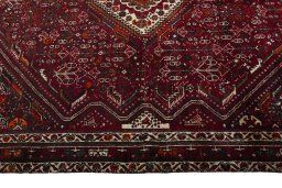 Full view of 2000s Shiraz rug from Iran / Persia, 270 × 176 cm in Red tones