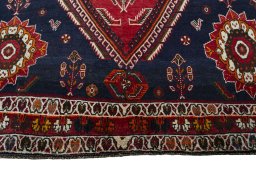 Close-up detail of 2000s Shiraz rug from Iran / Persia showing Wool weave