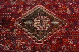 Central medallion detail of 2000s Shiraz rug from Iran / Persia