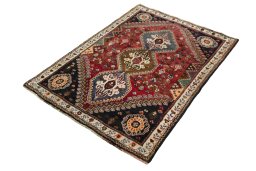 Corner detail of 2000s Shiraz rug showing border pattern and Wool pile