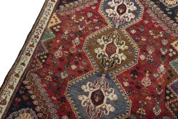 Backside of handmade 2000s Shiraz rug showing knot structure and weave density