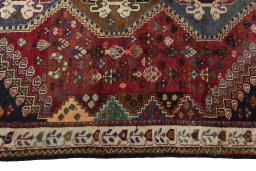 Close-up detail of 2000s Shiraz rug from Iran / Persia showing Wool weave