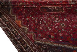 Close-up detail of 1970s Shiraz rug from Iran / Persia showing Wool weave