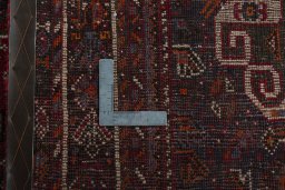 Backside of handmade 1970s Shiraz rug showing knot structure and weave density