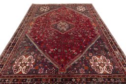Surface texture of 1970s Shiraz rug with natural Wool and intricate pattern