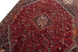 Backside of handmade 1970s Shiraz rug showing knot structure and weave density