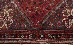 Full view of 1970s Shiraz rug from Iran / Persia, 313 × 220 cm in Red tones
