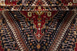 Corner detail of 2000s Shiraz rug showing border pattern and Wool pile