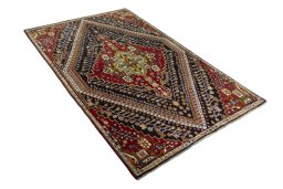 Close-up detail of 2000s Shiraz rug from Iran / Persia showing Wool weave