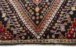 Close-up detail of 2000s Shiraz rug from Iran / Persia showing Wool weave