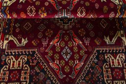 Corner detail of 2000s Shiraz rug showing border pattern and Wool pile