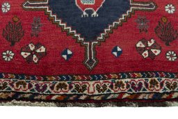 Central medallion detail of 2000s Shiraz rug from Iran / Persia