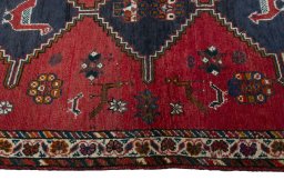 Close-up detail of 2000s Shiraz rug from Iran / Persia showing Wool weave