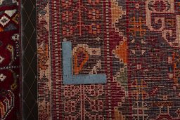 Surface texture of 2000s Shiraz rug with natural Wool and intricate pattern