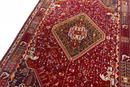 Backside of handmade 2000s Shiraz rug showing knot structure and weave density