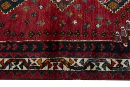 Close-up detail of 2000s Shiraz rug from Iran / Persia showing Wool weave