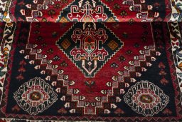 Full view of 2000s Shiraz rug from Iran / Persia, 170 × 117 cm in Red tones