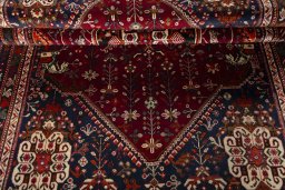 Corner detail of 2000s Shiraz rug showing border pattern and Wool pile