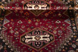 Full view of 2000s Shiraz rug from Iran / Persia, 175 × 118 cm in Red tones