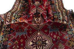 Corner detail of 2000s Shiraz rug showing border pattern and Wool pile