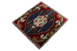 Corner detail of 2000s Shiraz rug showing border pattern and Wool pile