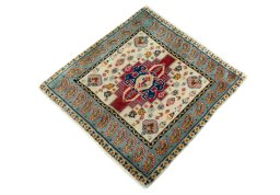 Corner detail of 2000s Shiraz rug showing border pattern and Wool pile
