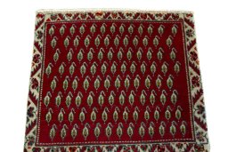 Surface texture of 2000s Shiraz rug with natural Wool and intricate pattern