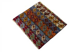 Corner detail of 2000s Shiraz rug showing border pattern and Wool pile