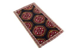 Corner detail of 2000s Shiraz rug showing border pattern and Wool pile