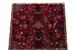 Surface texture of 2000s Shiraz rug with natural Wool and intricate pattern