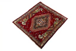 Corner detail of 2000s Shiraz rug showing border pattern and Wool pile