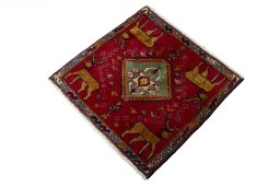 Corner detail of 2000s Shiraz rug showing border pattern and Wool pile