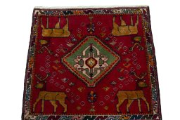 Surface texture of 2000s Shiraz rug with natural Wool and intricate pattern