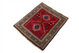 Corner detail of 2000s Shiraz rug showing border pattern and Wool pile