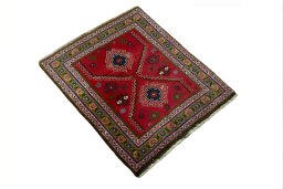 Close-up detail of 2000s Shiraz rug from Iran / Persia showing Wool weave