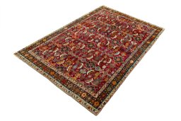 Corner detail of 2000s Shiraz rug showing border pattern and Wool pile