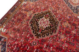 Backside of handmade 2000s Shiraz rug showing knot structure and weave density