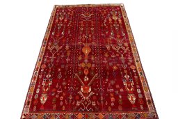 Backside of handmade 2000s Shiraz rug showing knot structure and weave density