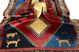 Corner detail of 2000s Shiraz rug showing border pattern and Wool pile