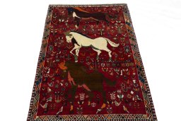Surface texture of 2000s Shiraz rug with natural Wool and intricate pattern