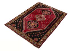 Corner detail of 2000s Shiraz rug showing border pattern and Wool pile