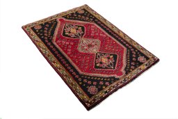Close-up detail of 2000s Shiraz rug from Iran / Persia showing Wool weave