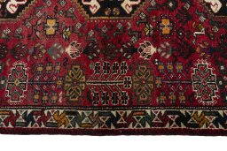 Close-up detail of 2000s Shiraz rug from Iran / Persia showing Wool weave