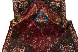 Close-up detail of 2000s Shiraz rug from Iran / Persia showing Wool weave