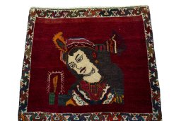 Surface texture of 2000s Shiraz rug with natural Wool and intricate pattern