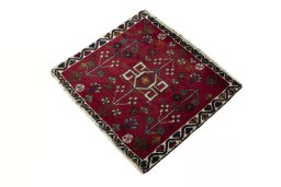 Corner detail of 2000s Shiraz rug showing border pattern and Wool pile