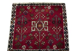 Surface texture of 2000s Shiraz rug with natural Wool and intricate pattern